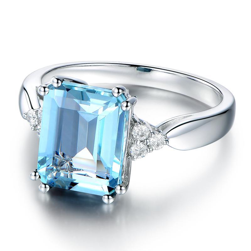 3ct Emerald Cut Blue Topaz Created Diamond Ring