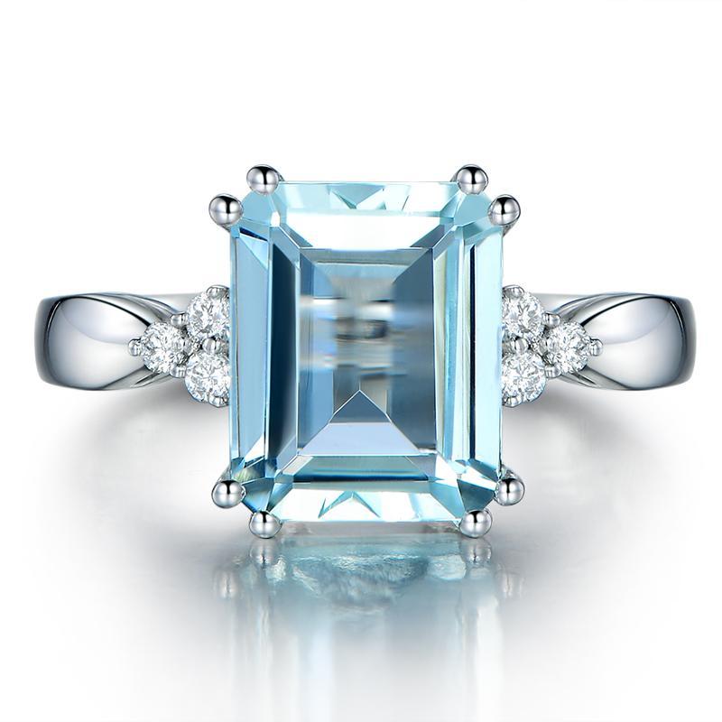 3ct Emerald Cut Blue Topaz Created Diamond Ring