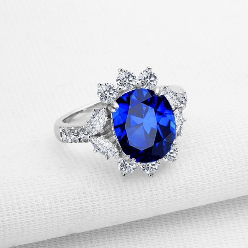 Floral Design Oval Created Blue Diamond Ring